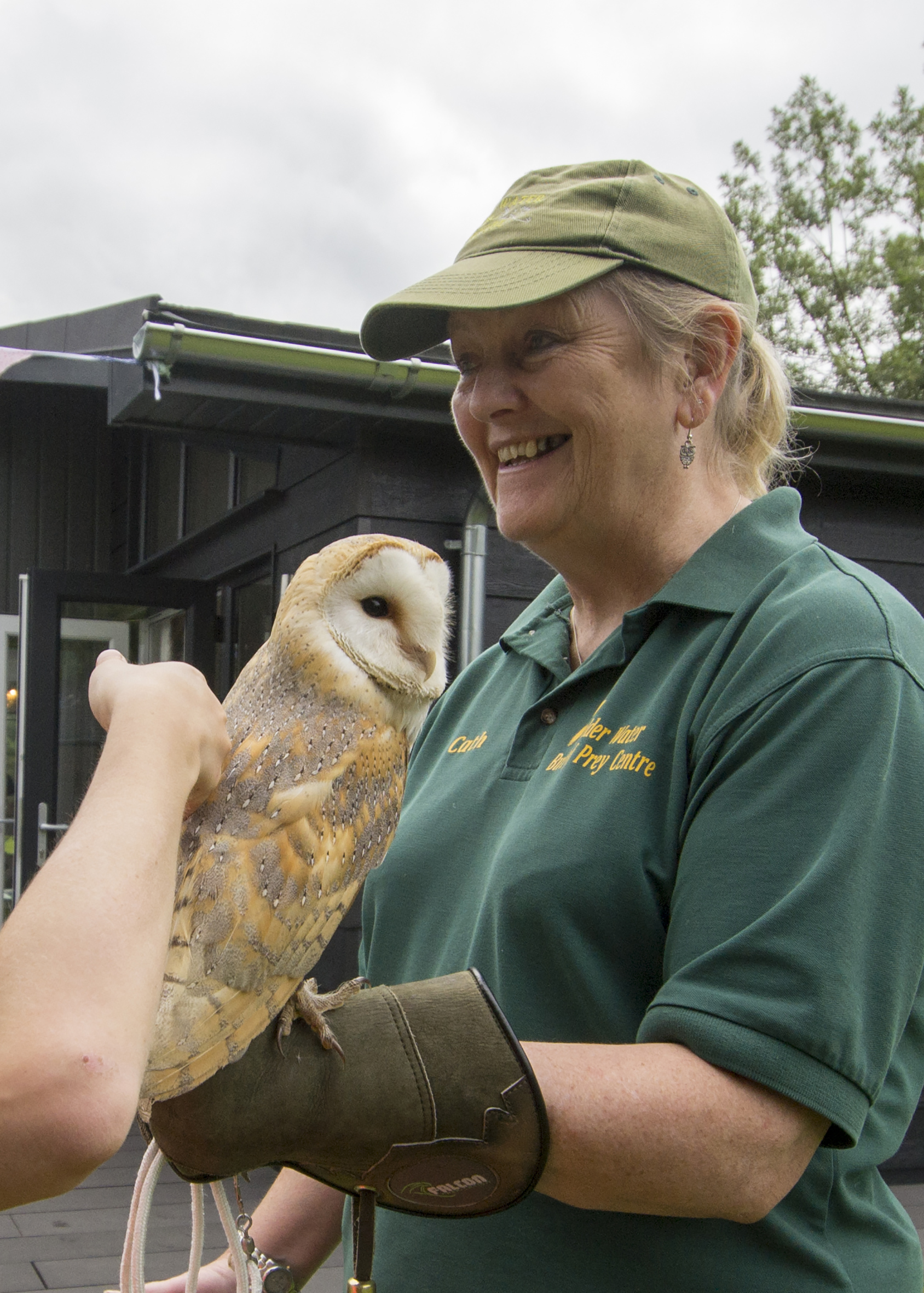 Birds of Prey at Kielder Waterside. Ranger holding a barn owl